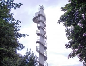 white concrete and metal tower thumbnail