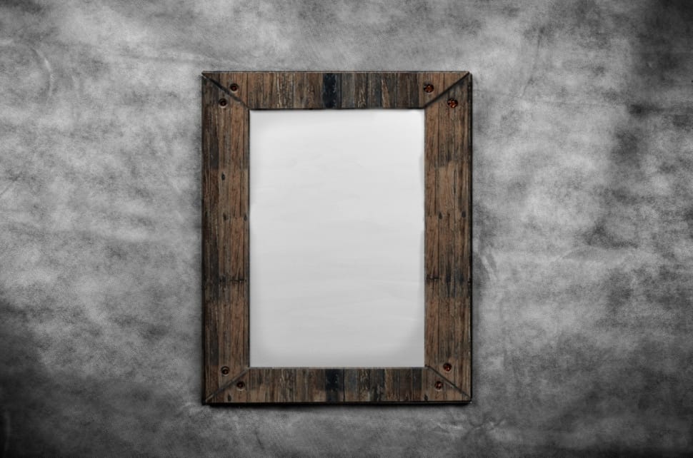 brown and white wooden rectangular picture frame preview