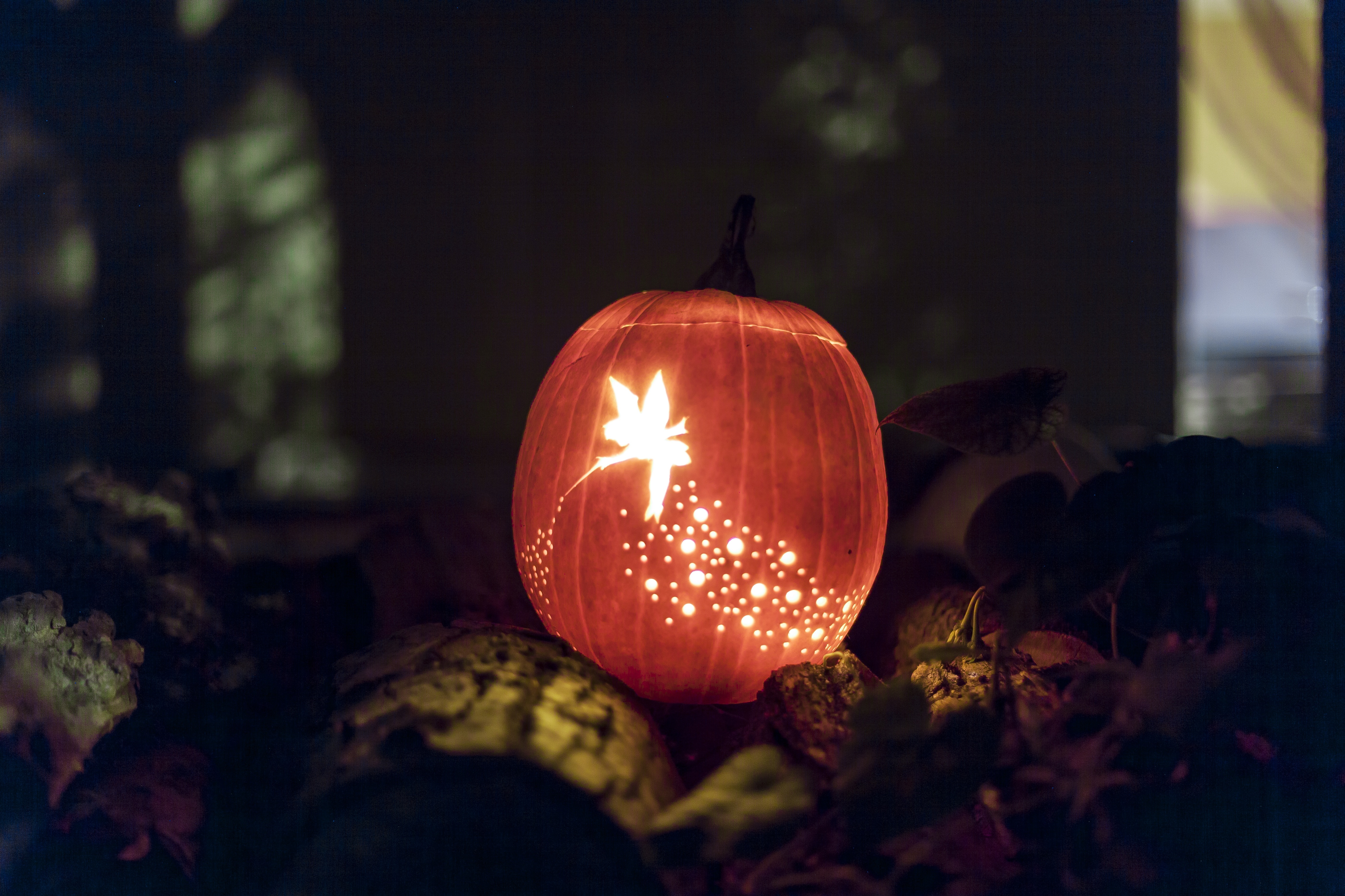 red and white pumpkin lamp