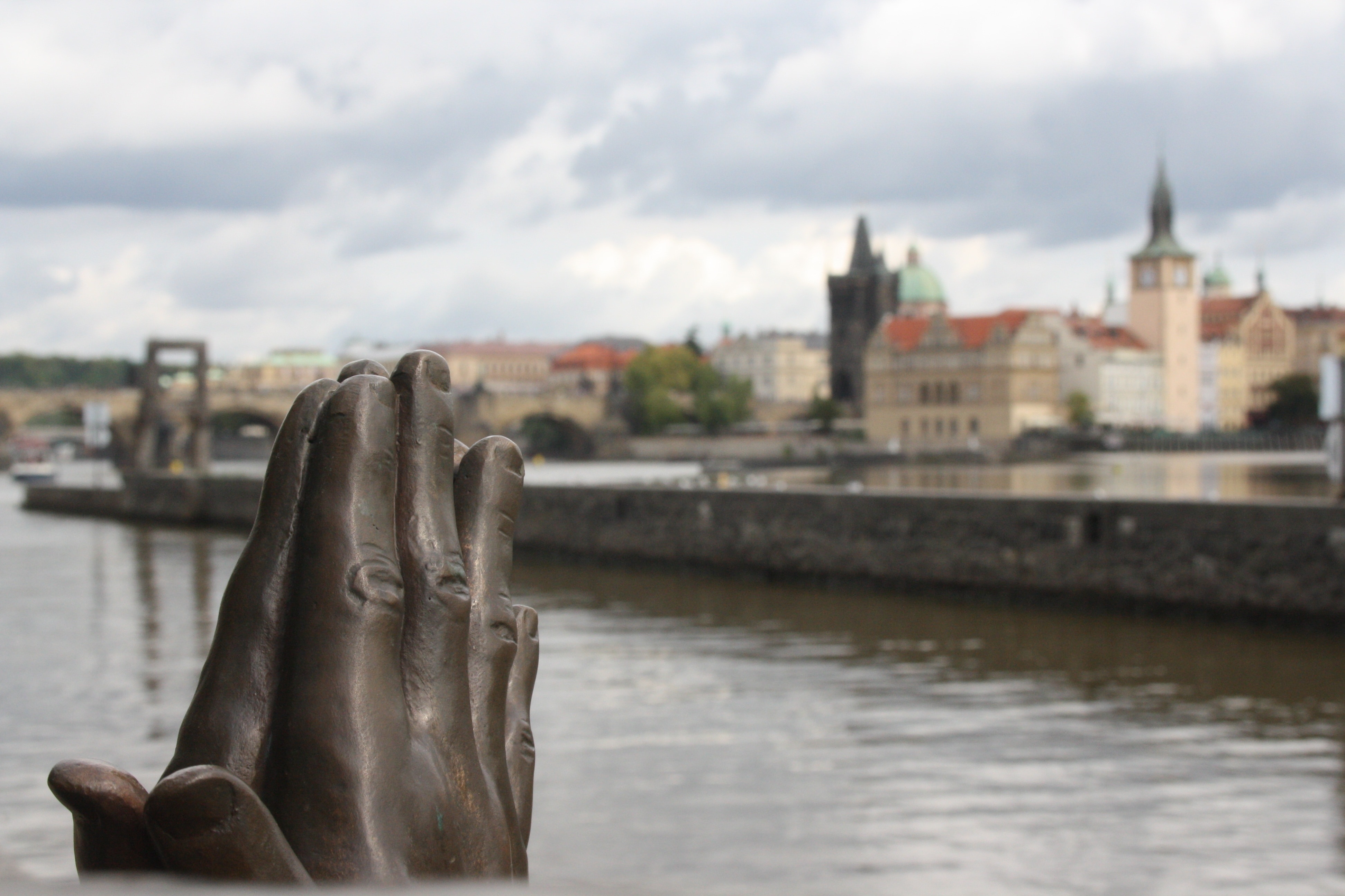 grey concrete hand statue