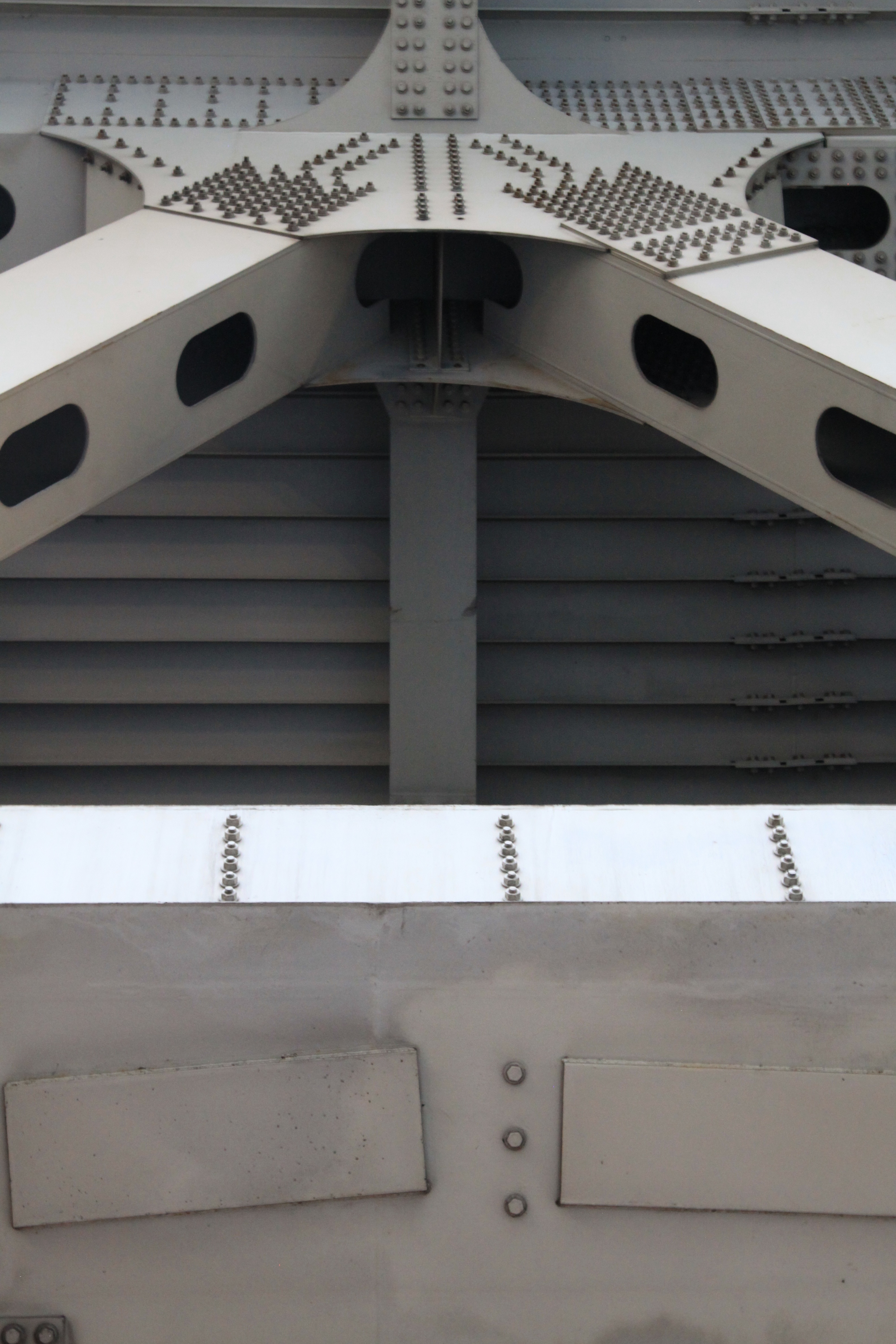 white metal suspension bridge parts