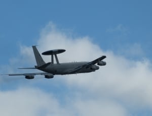 gray airline flying above the sky thumbnail