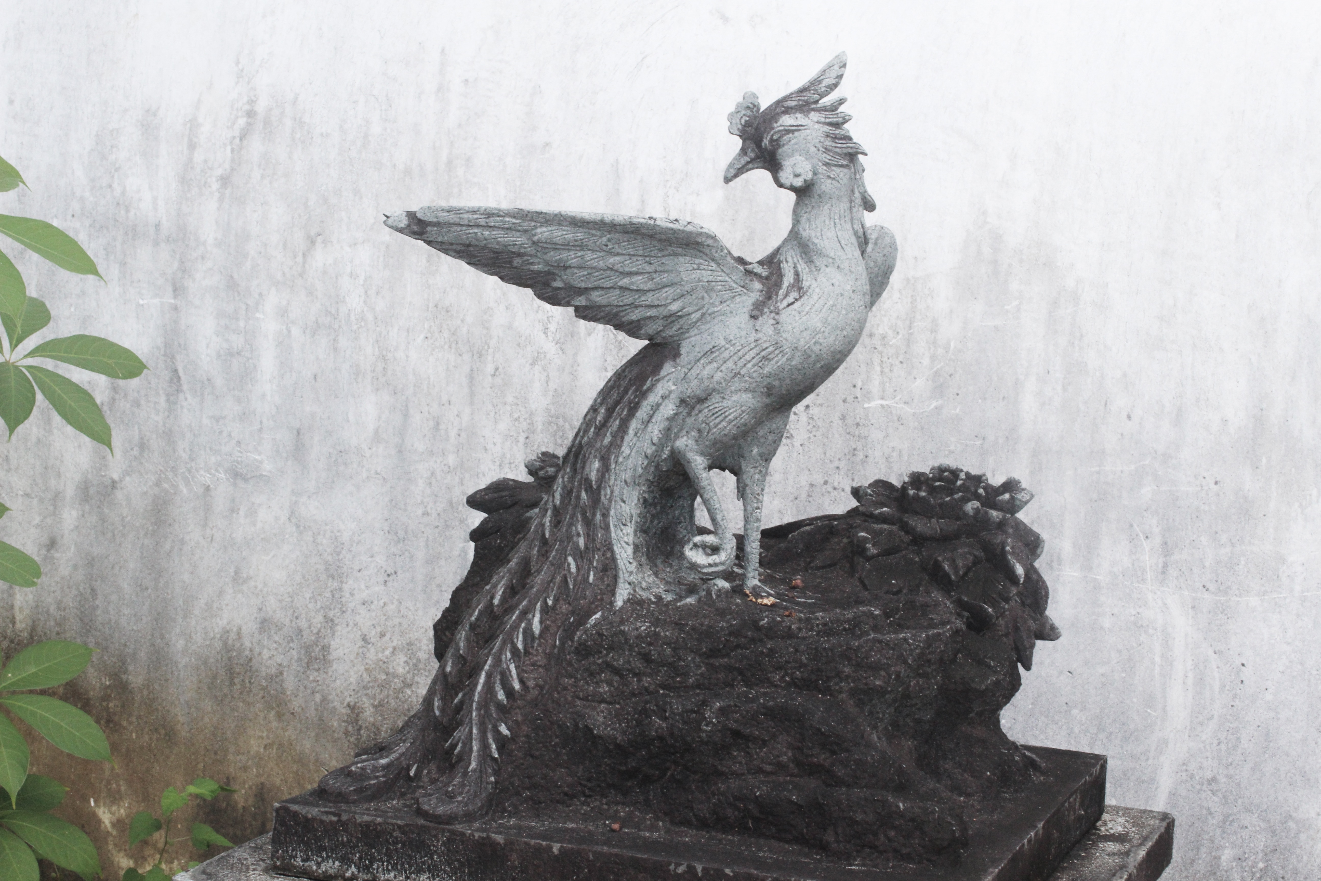bird gray statuette