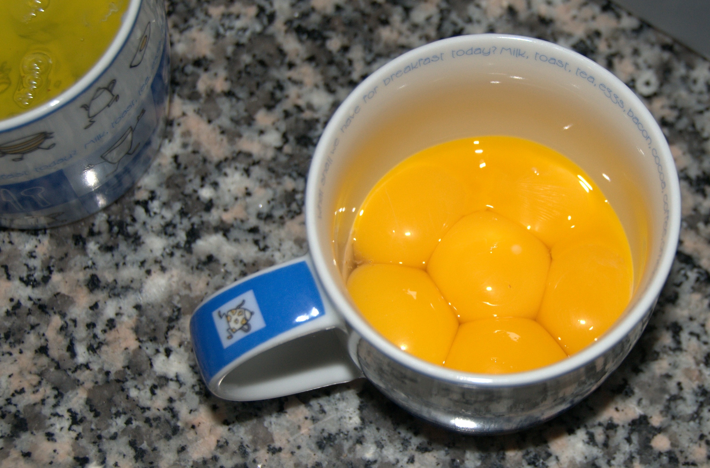 egg yolk on white ceramic mug