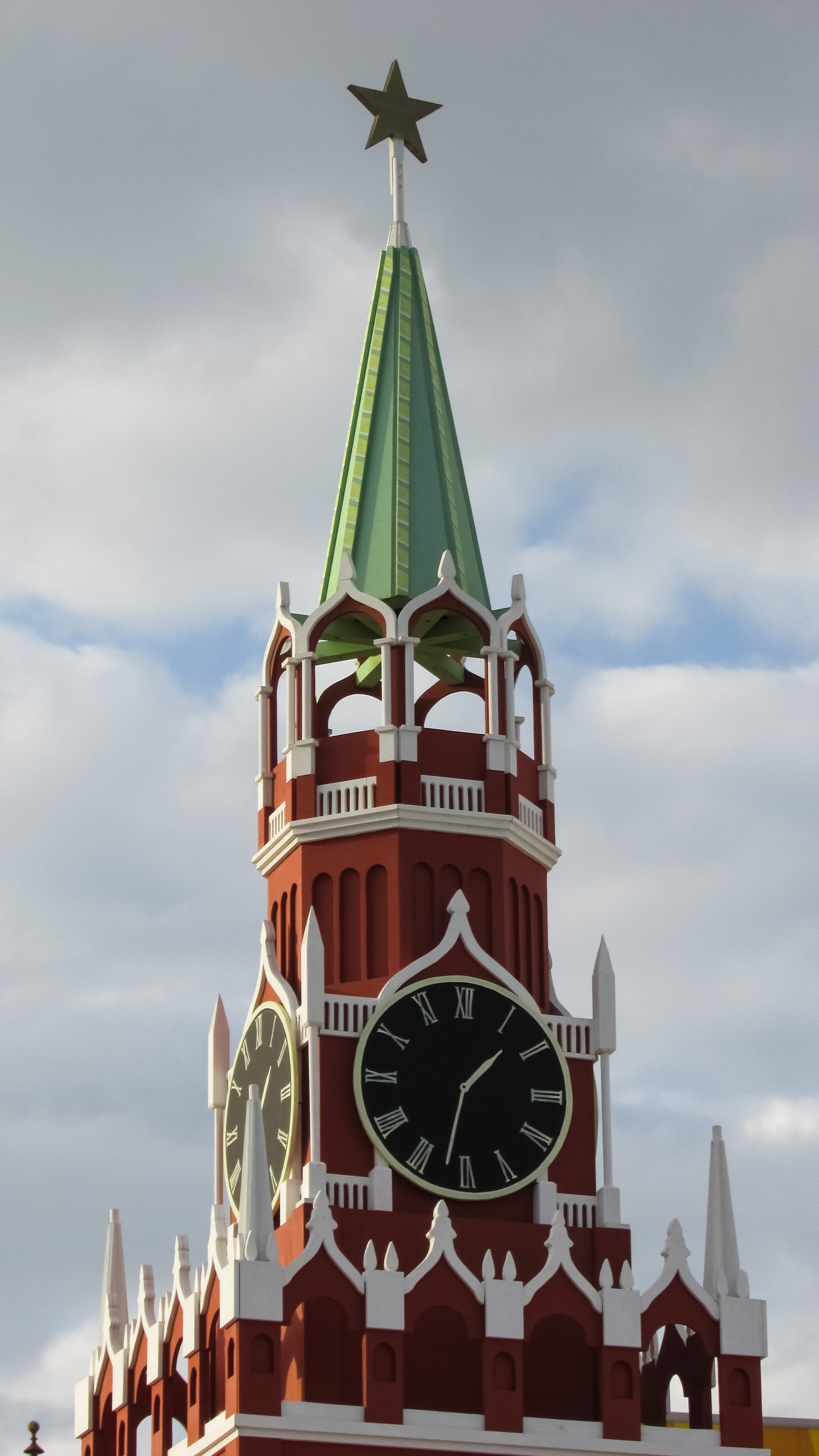 green and brown  tower clock