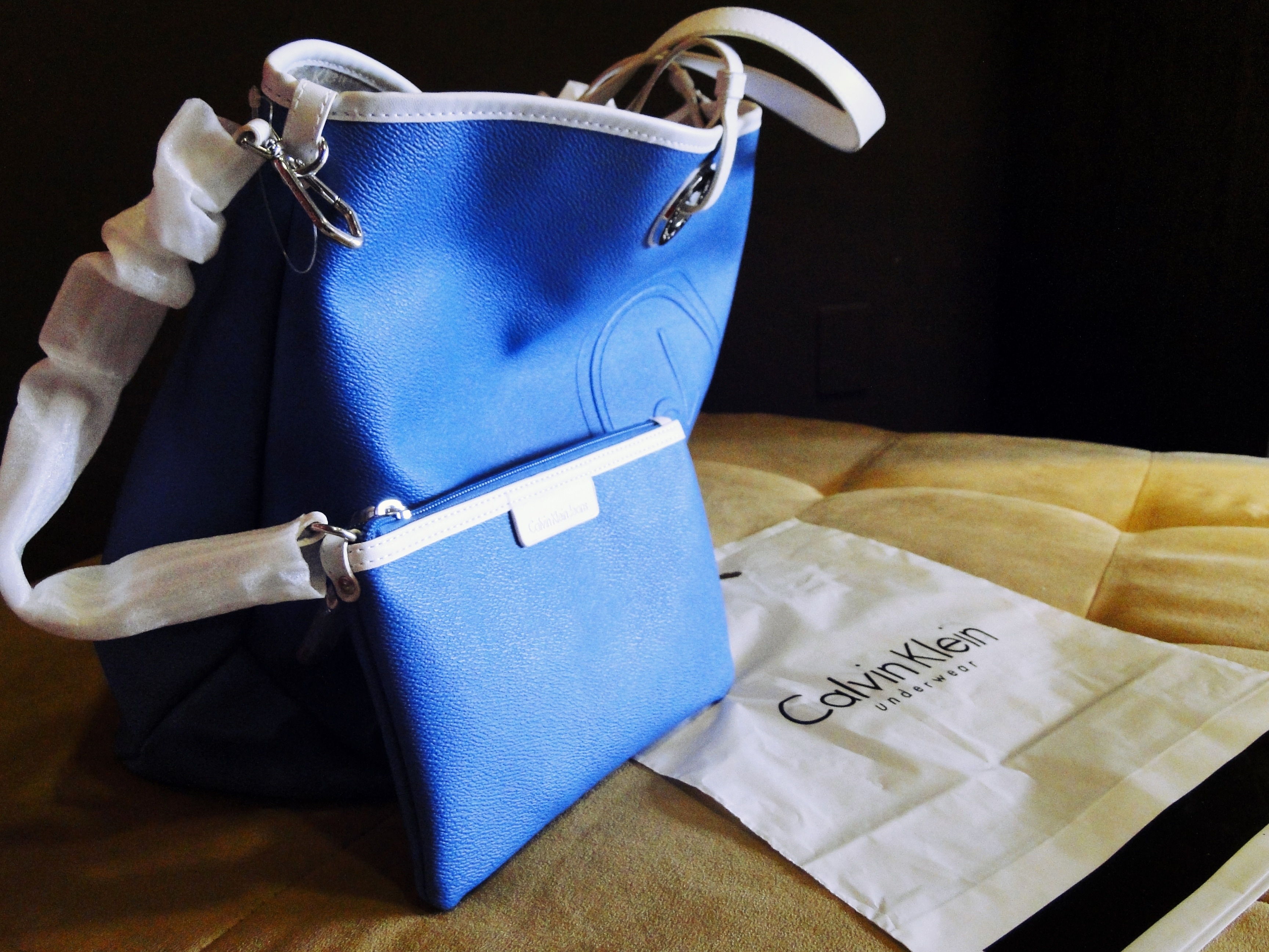 blue and white calvin klein tote bag