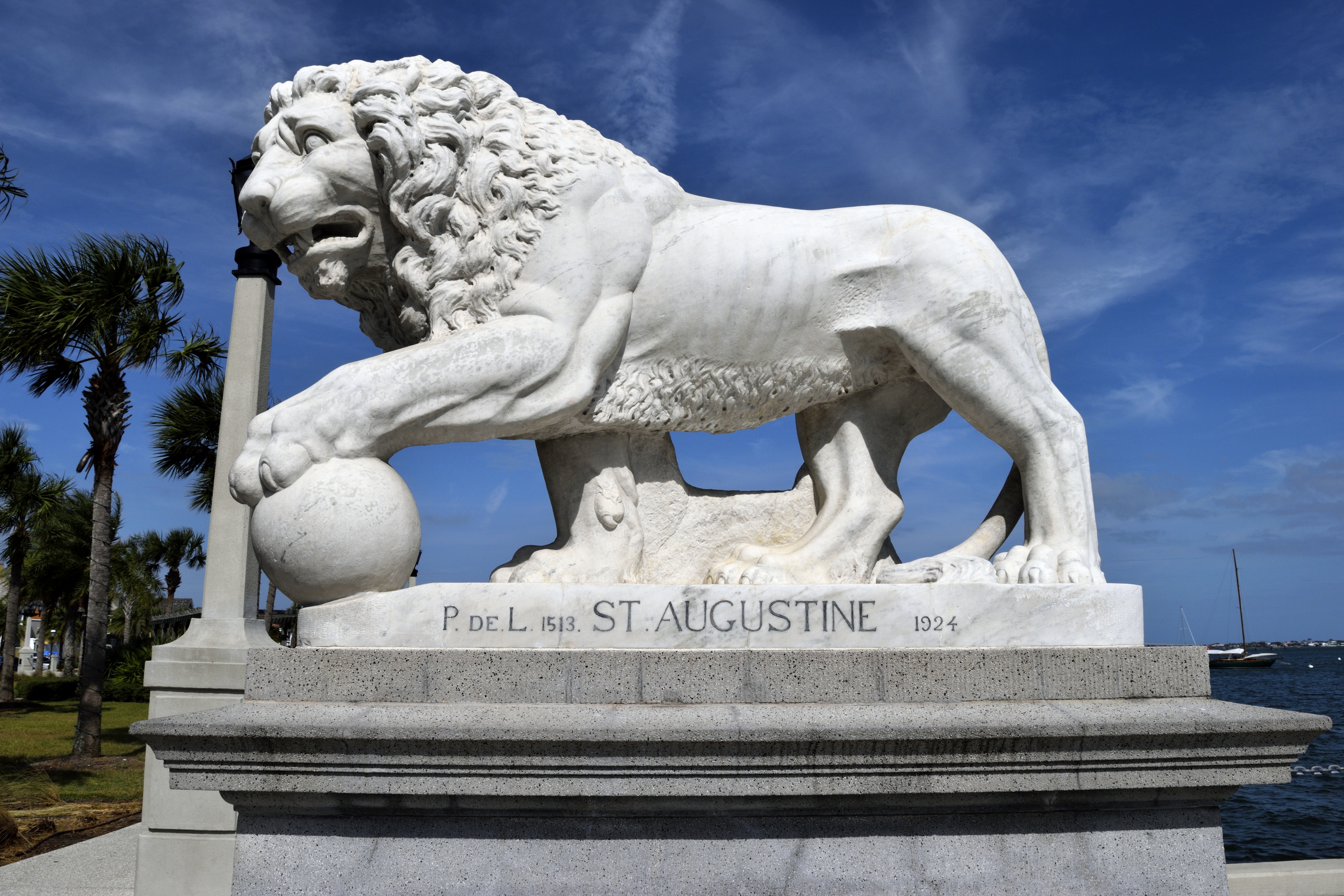 white concrete st. augustine 1924 lion statue