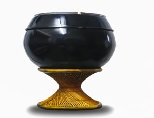 black ceramic vase and brown straps spiral stand thumbnail