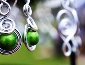 women's silver framed green bead accessory thumbnail