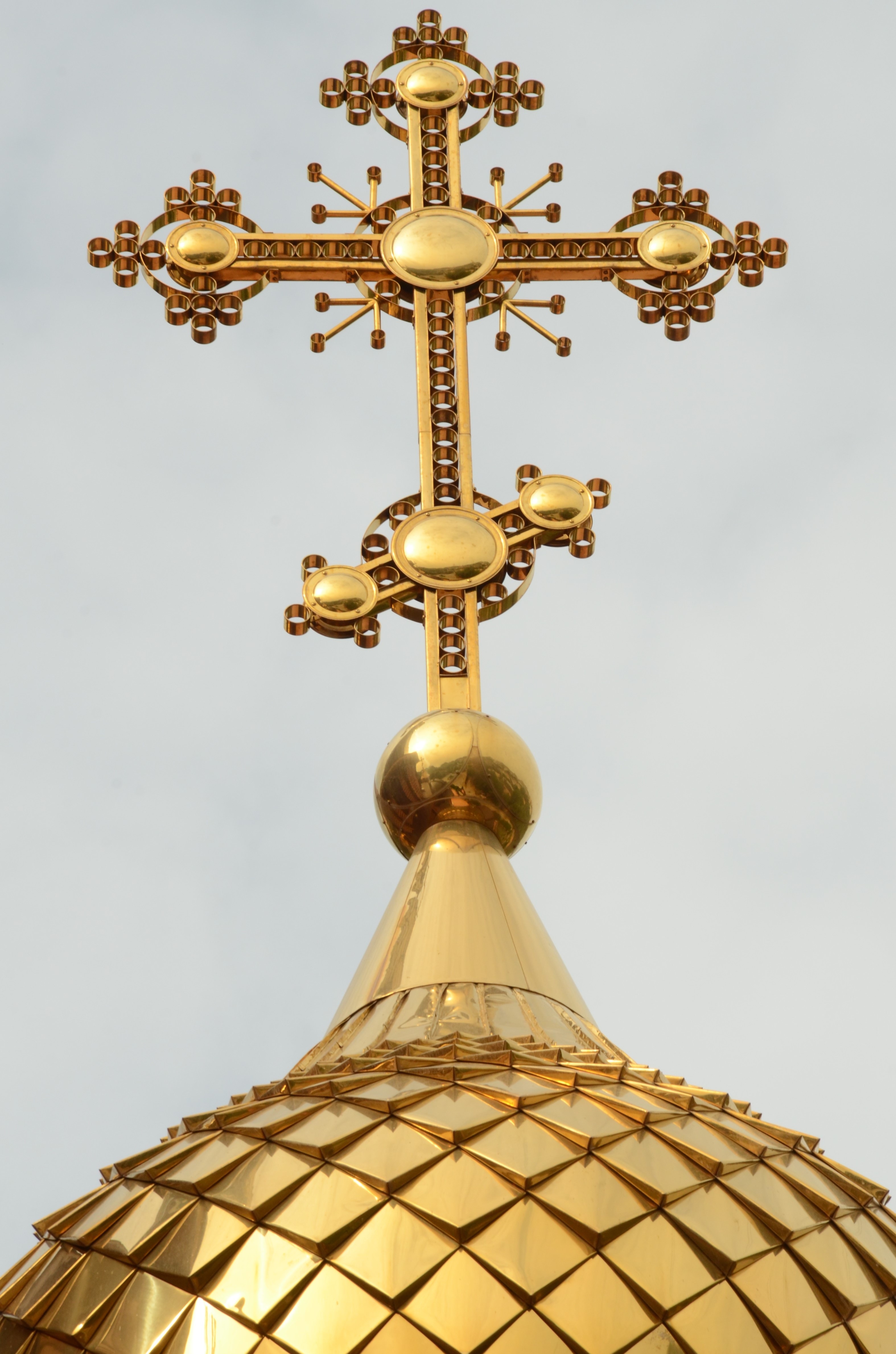 brass cross tower decor