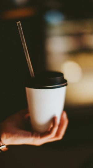 white and black disposable coffee cup thumbnail