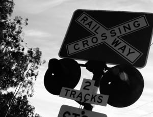 gray scale of rail way crossing sign thumbnail