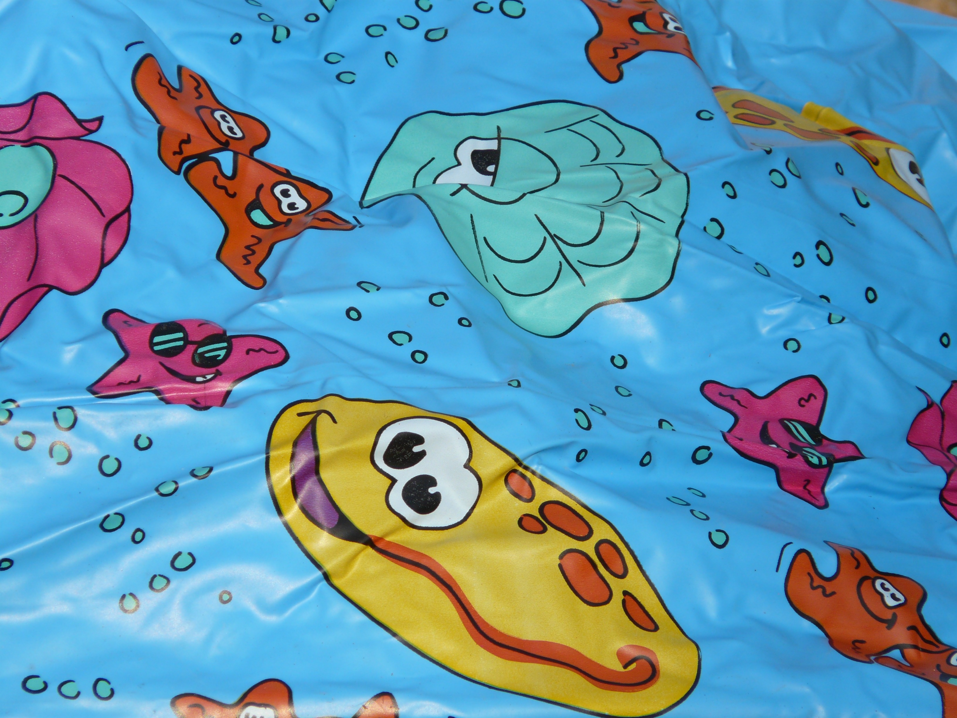 teal blue yellow and pink inflatable textile