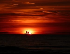 jailhouse of sailboat on ocean at golden hour thumbnail