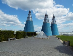 three blue cone under blue sky and white clouds thumbnail