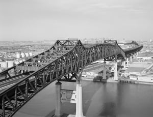 greyscale photo of steel truss bridge thumbnail