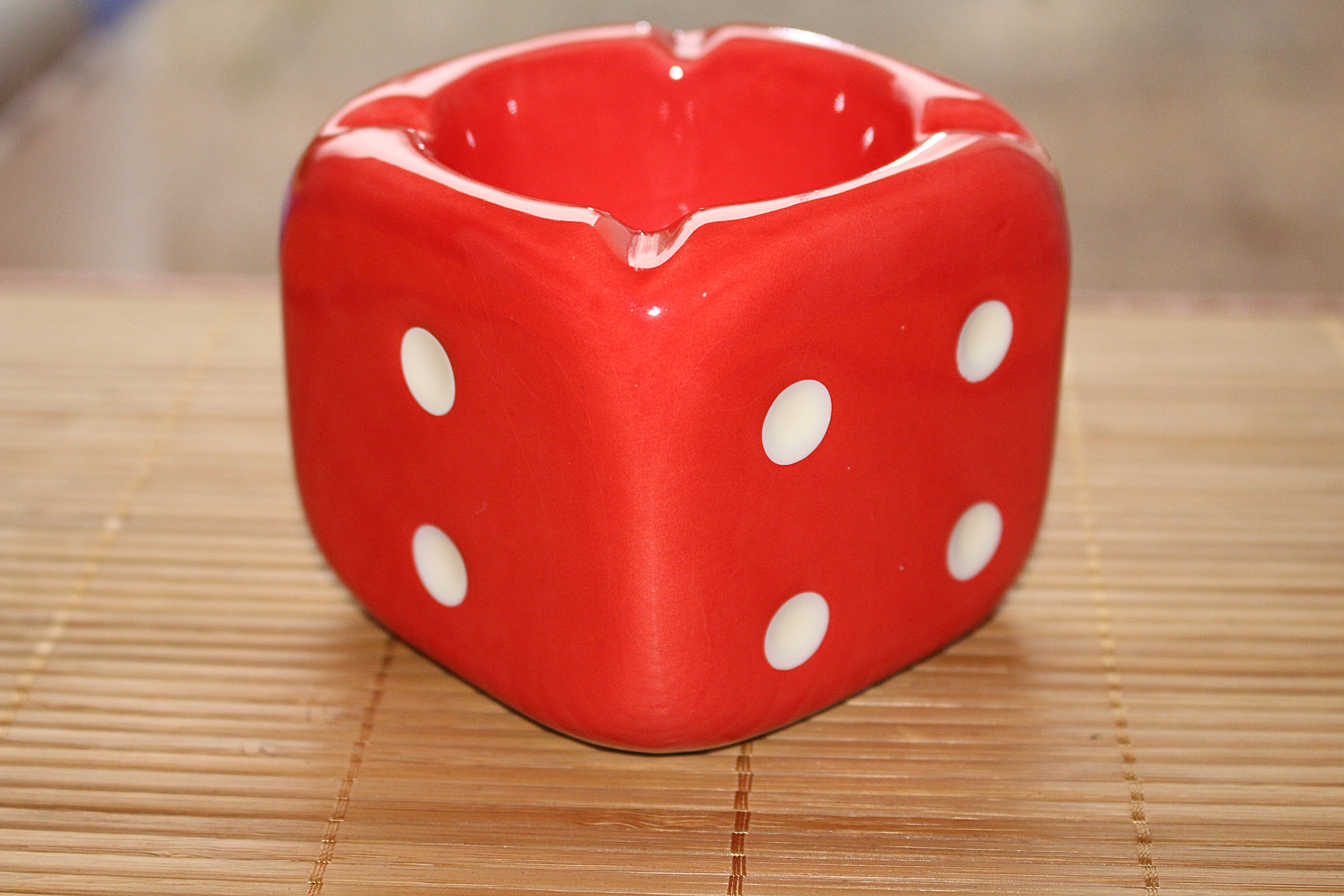 red and white dice themed  ashtray
