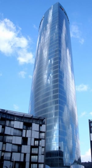 blue glass high rise building thumbnail