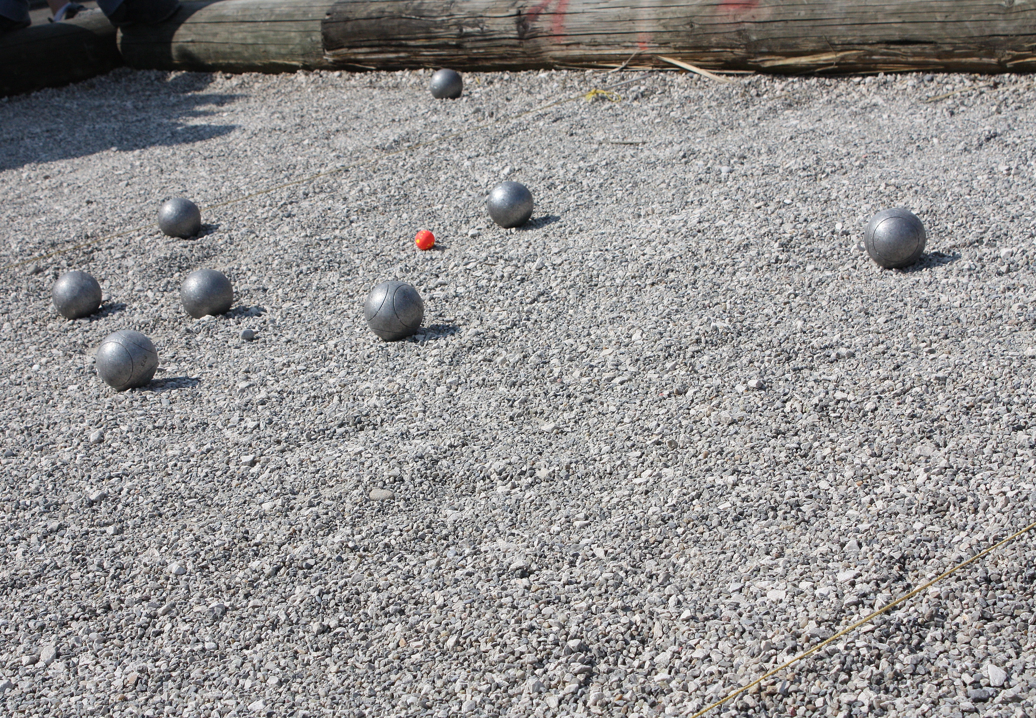 7 metal sport ball on ground during daytime