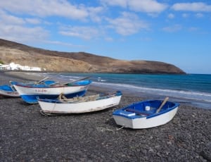blue and white boats thumbnail
