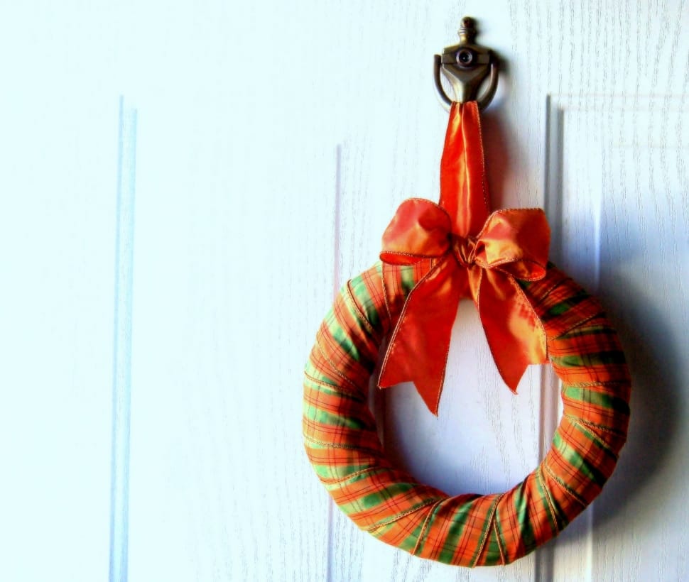 green and orange bow accent hanging decor preview