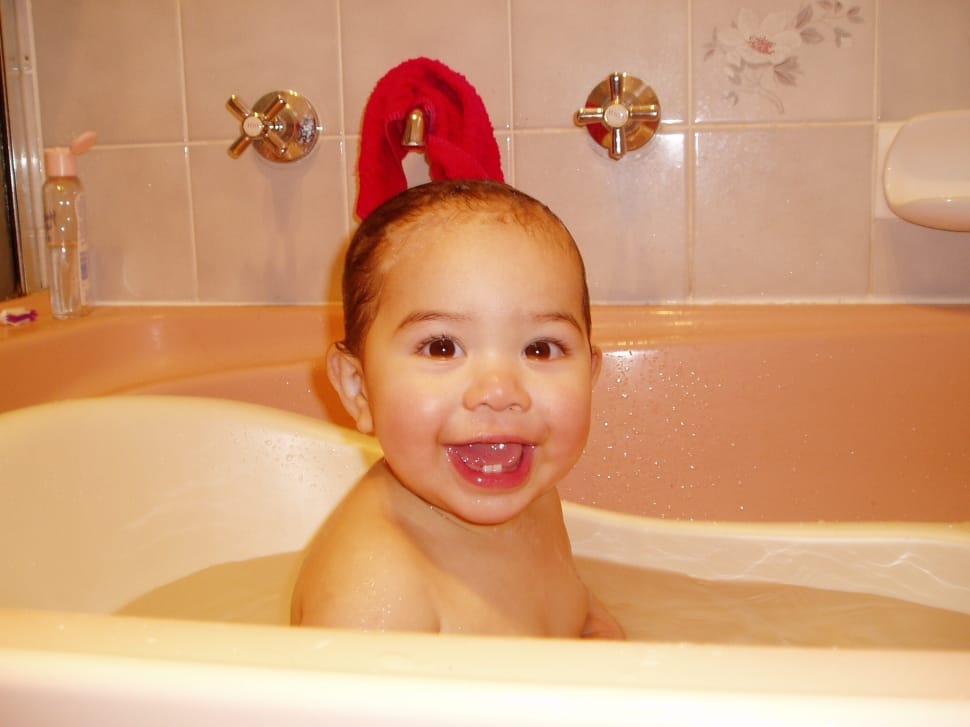 toddler in white bath tub preview