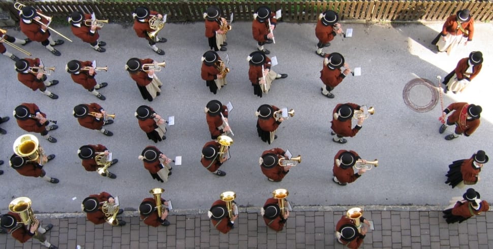 marching bands playing instruments on street preview