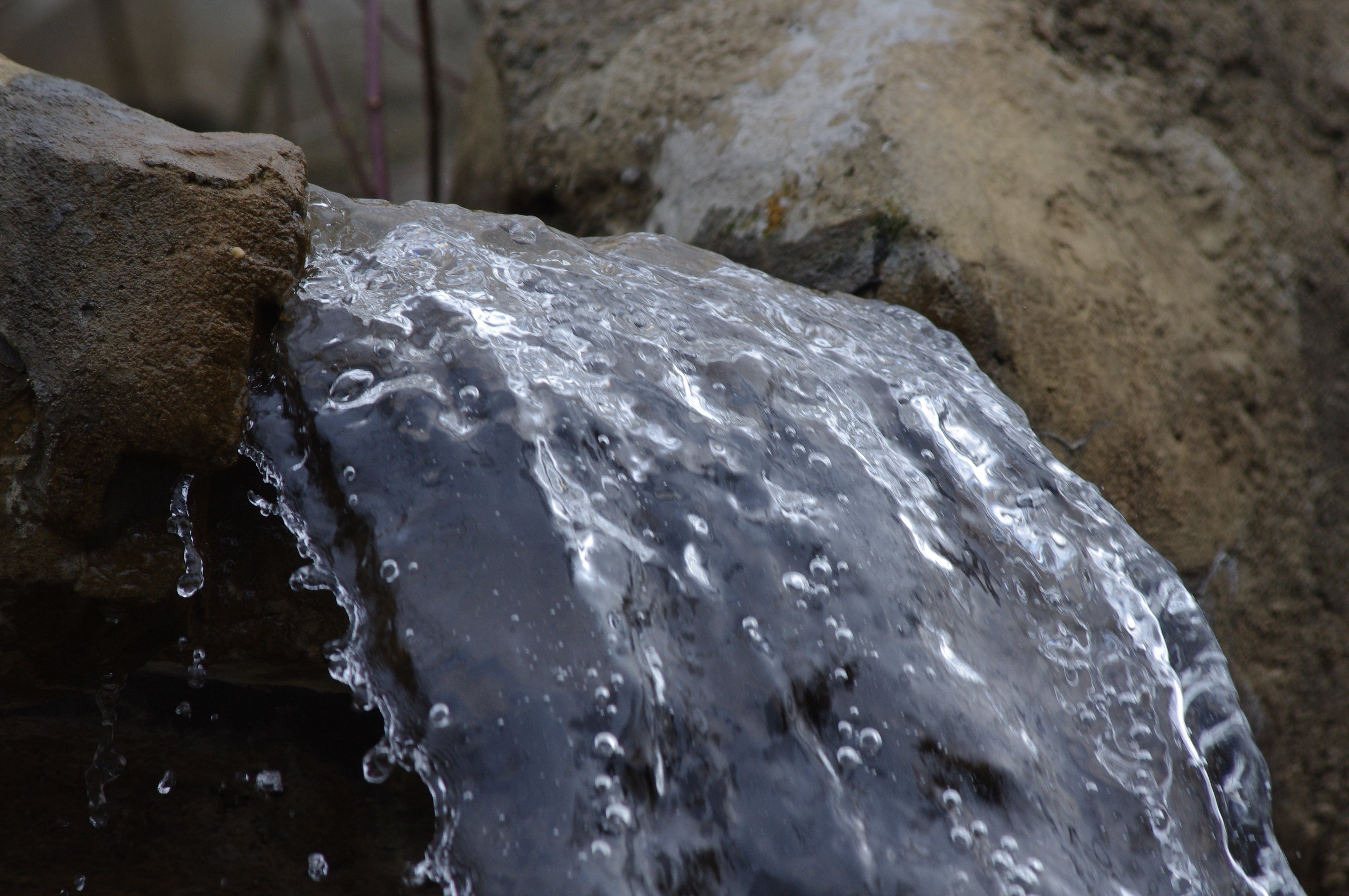 body of water and brown stone fragment