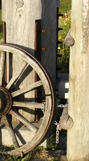 brown wooden spinning wheel thumbnail