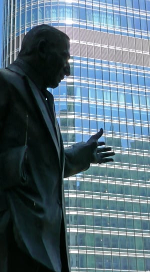 man grey suit statuette thumbnail