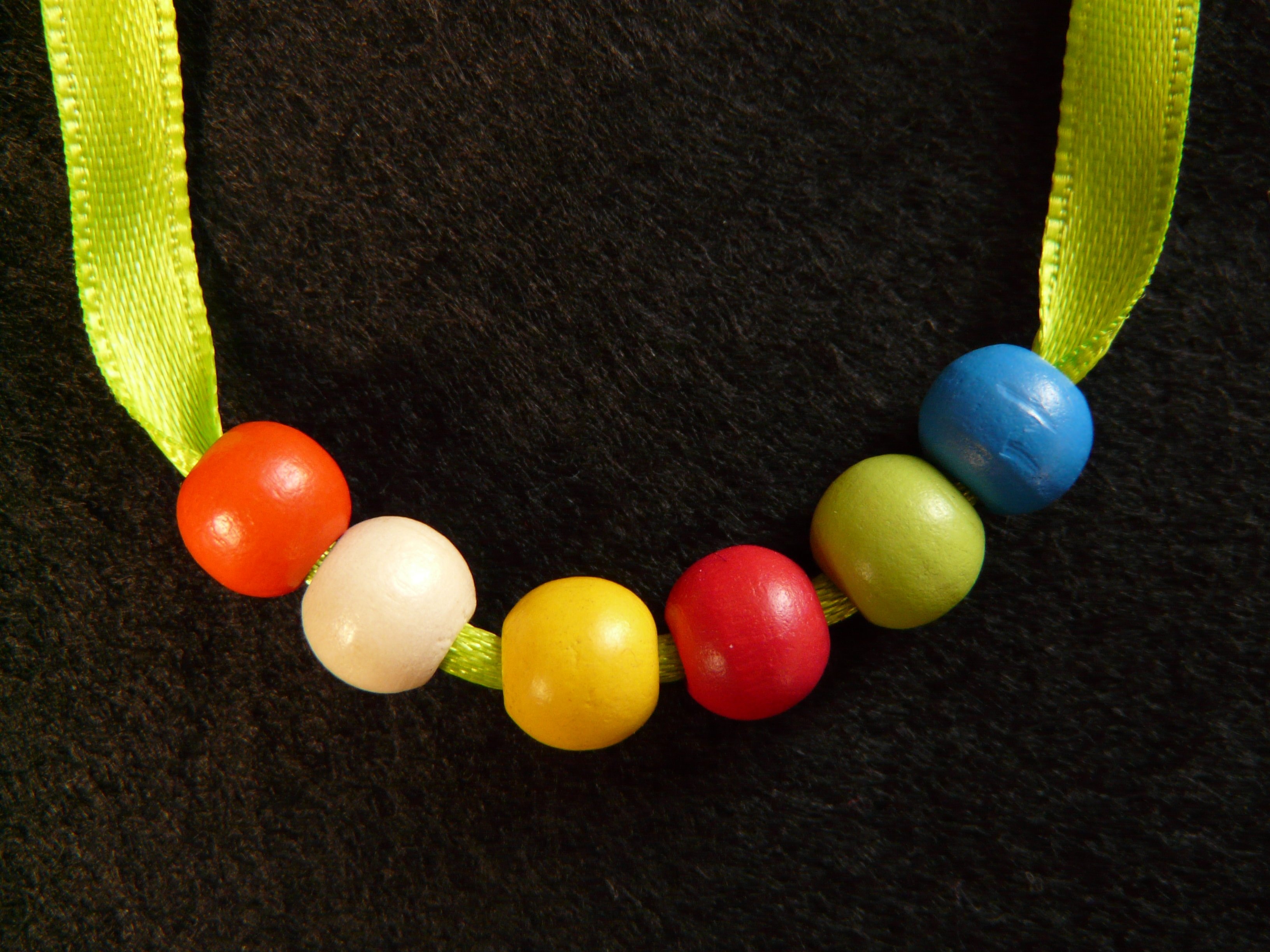 green red blue and white beaded necklace