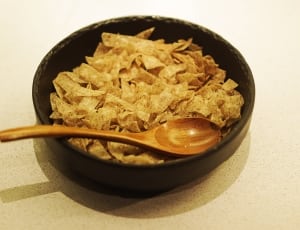 chips on black bowl and wooden spoon thumbnail