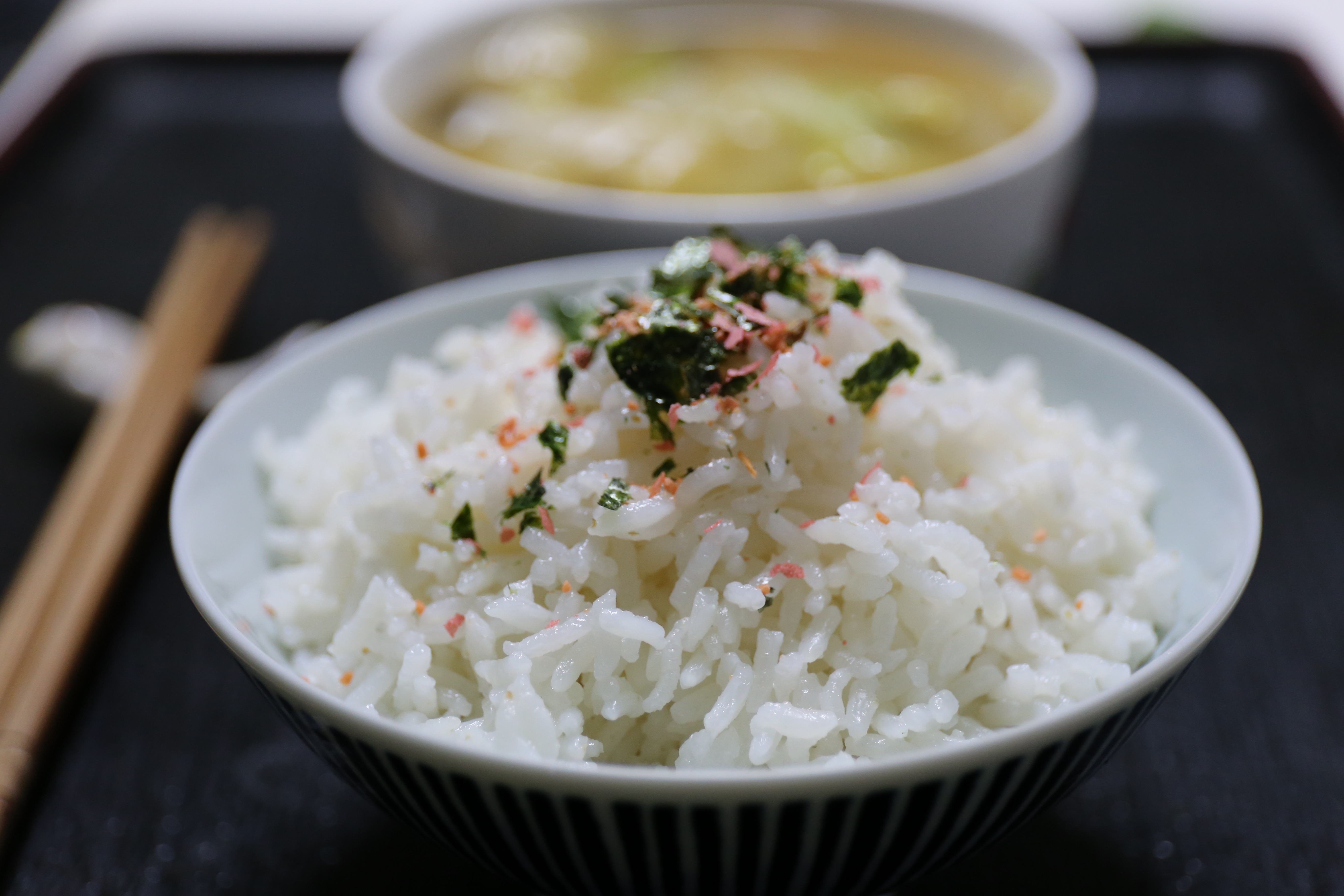 cook rice with on white ceramic bowl