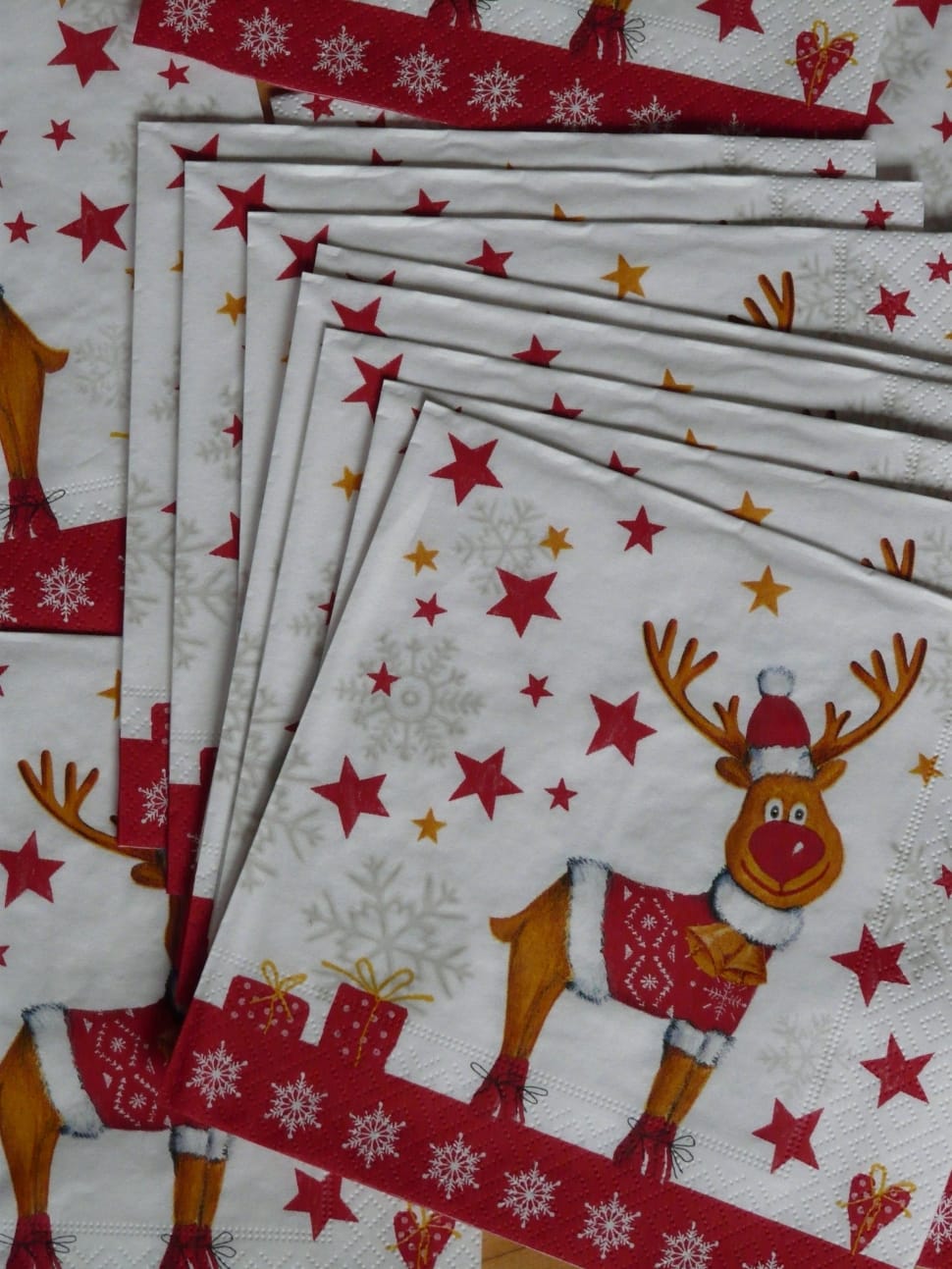 rudolph the red nose reindeer print white and red textiles preview