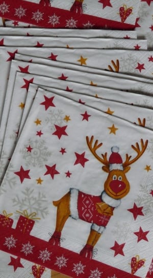 rudolph the red nose reindeer print white and red textiles thumbnail