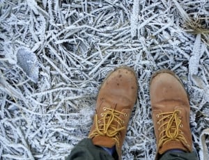 pair of brown hiking boots thumbnail