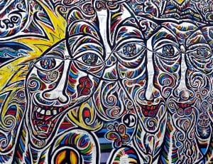 red and multicolored faces painting thumbnail