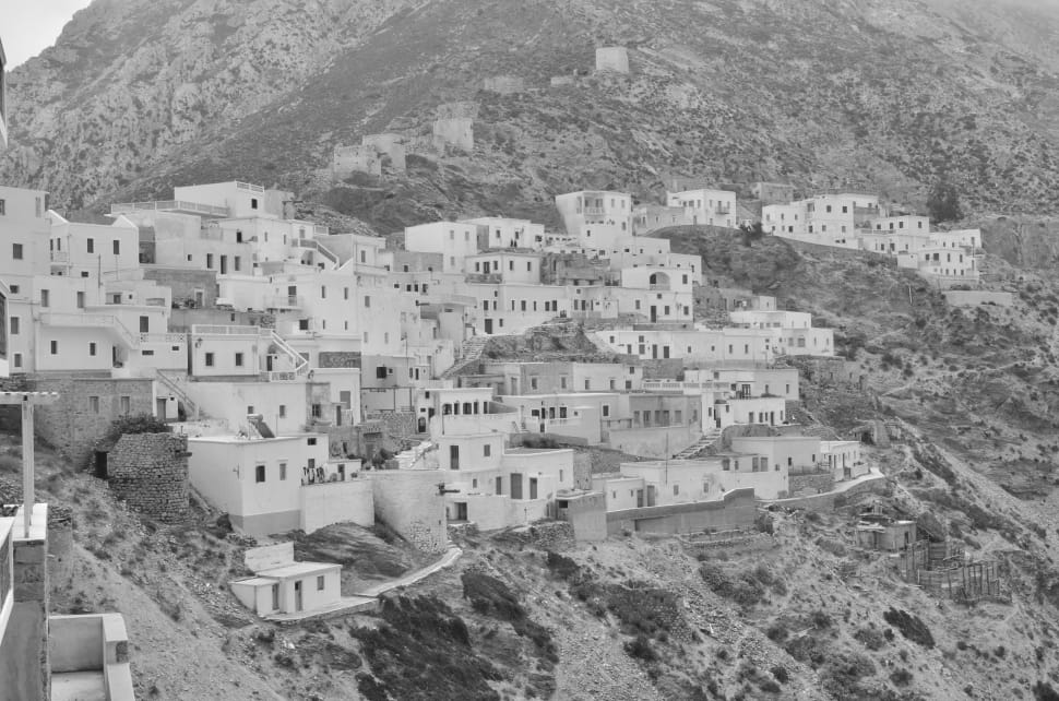 building by the mountain greyscale photo preview