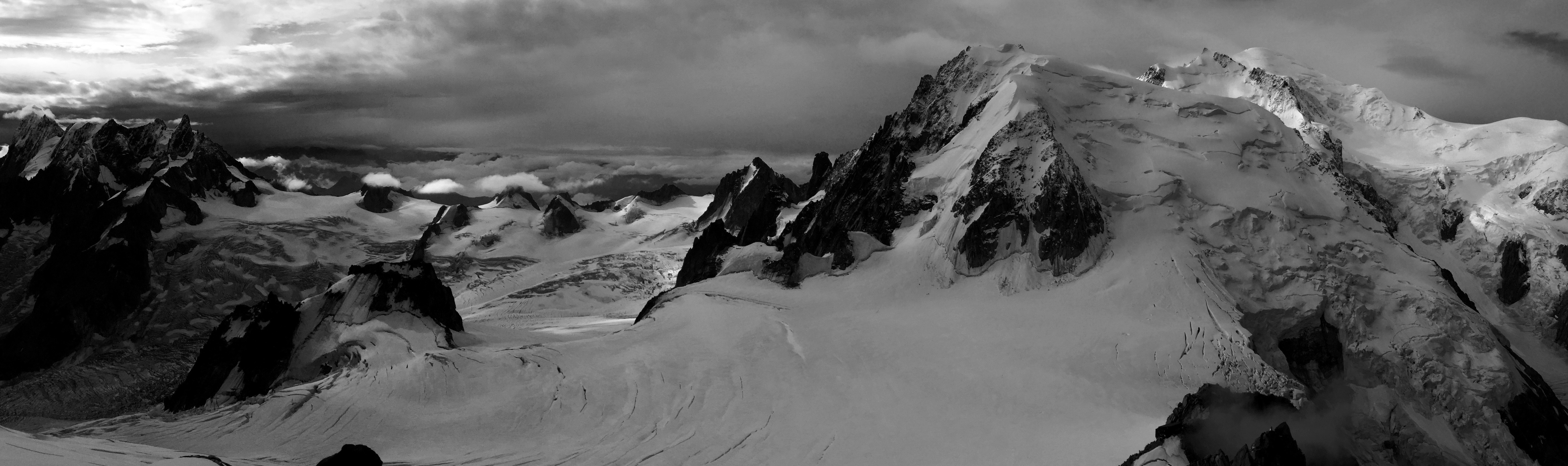 grayscale snow covered mountain