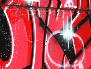 red black and white graffiti painting thumbnail