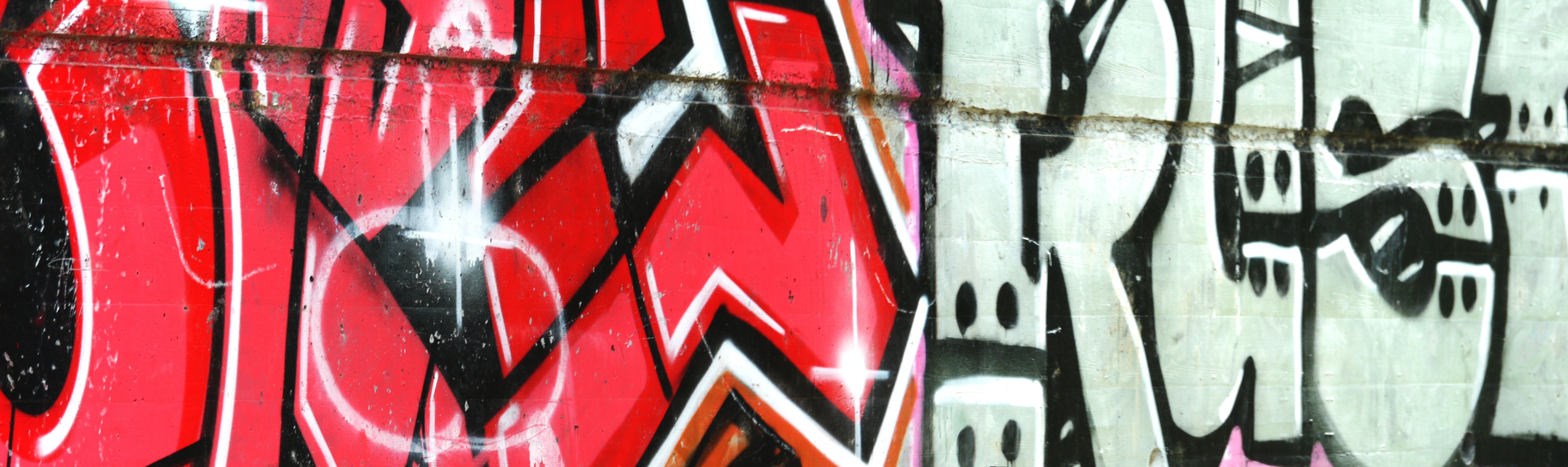 red black and white graffiti painting