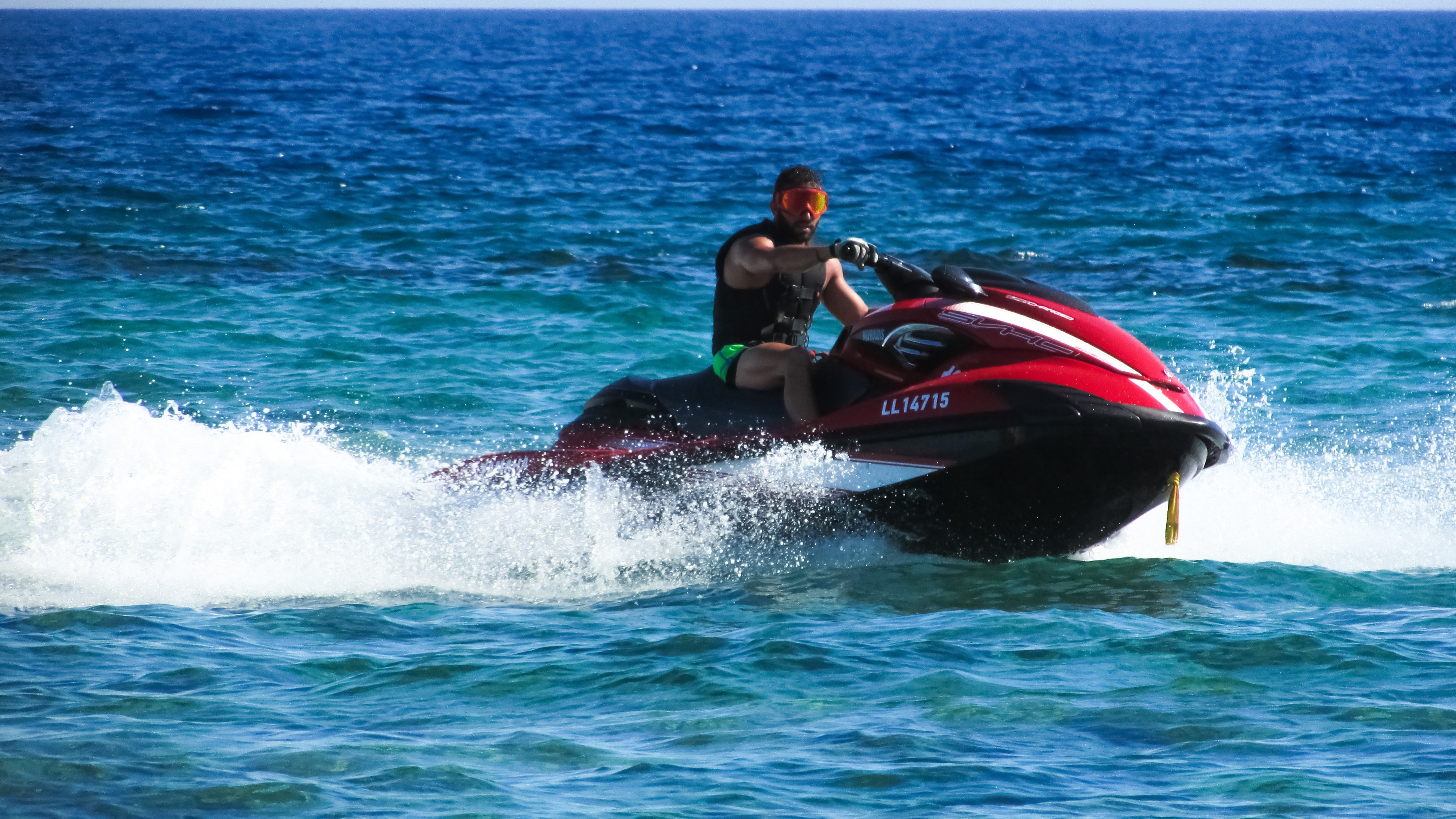 red and black personal water craft