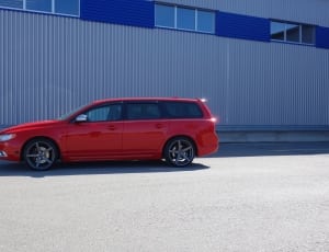 red station wagon during day time thumbnail