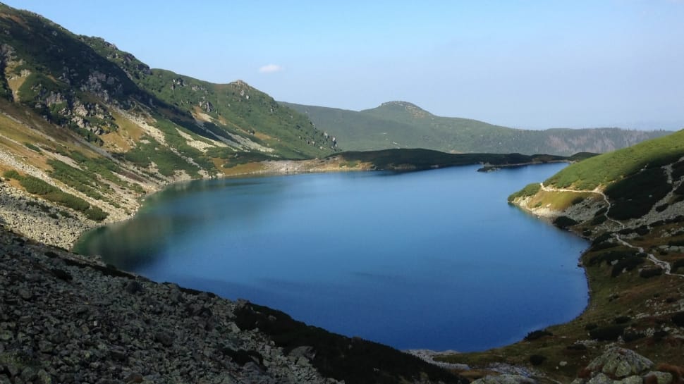 lake surrounding mountain ranges preview