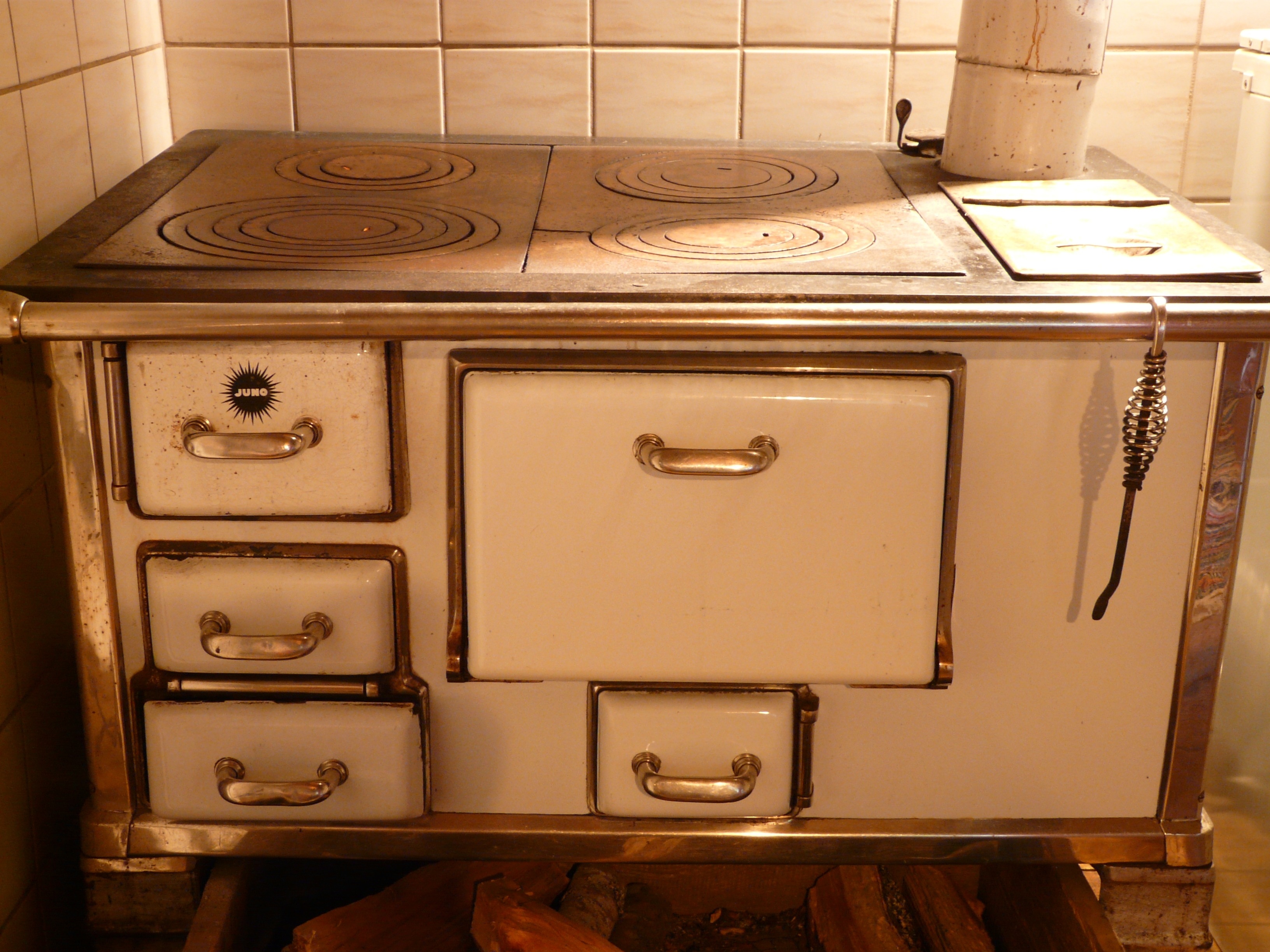 white and stainless steel stove oven