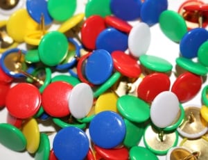 blue red and white multicolored pins thumbnail