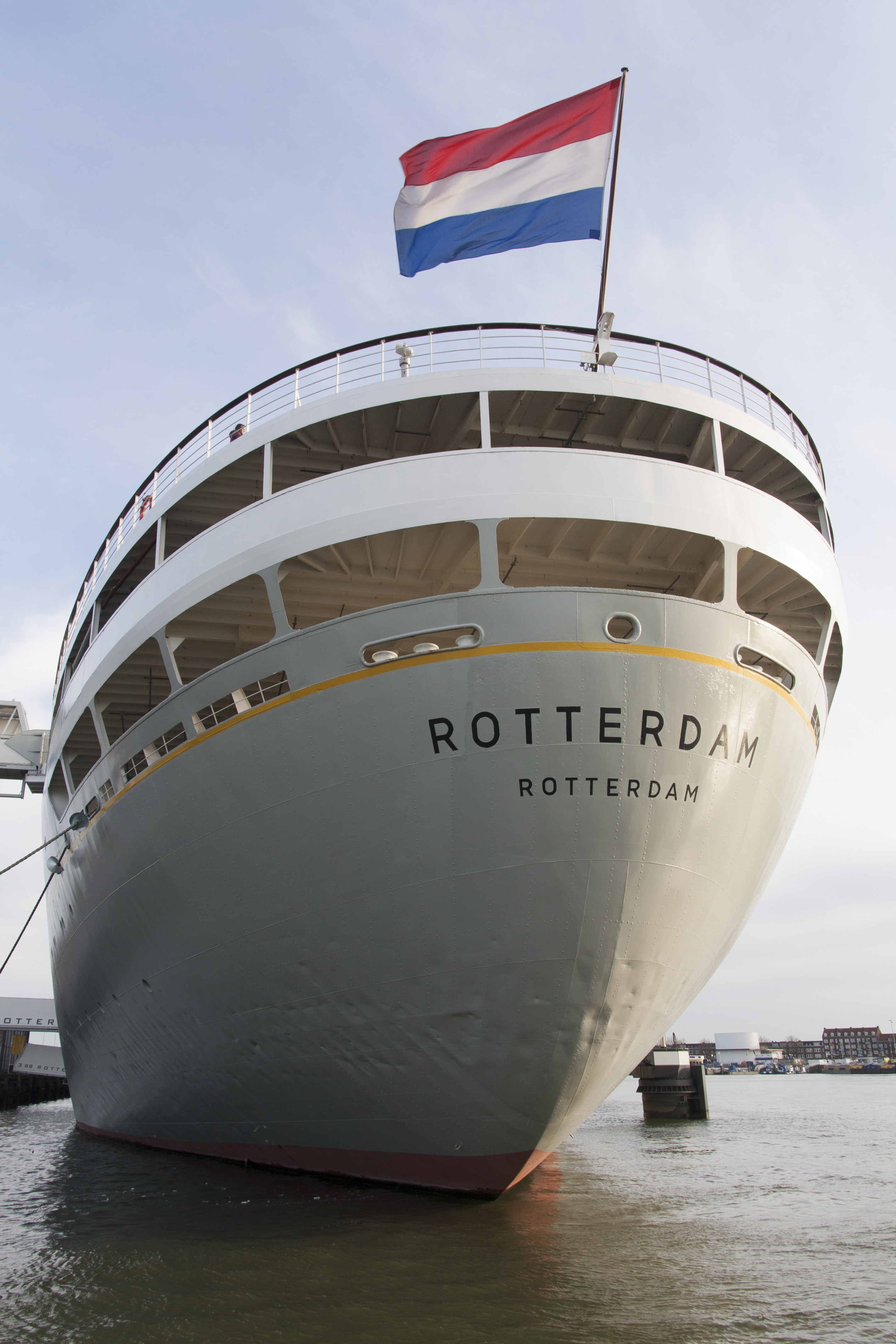 white and yellow rotterdam boat