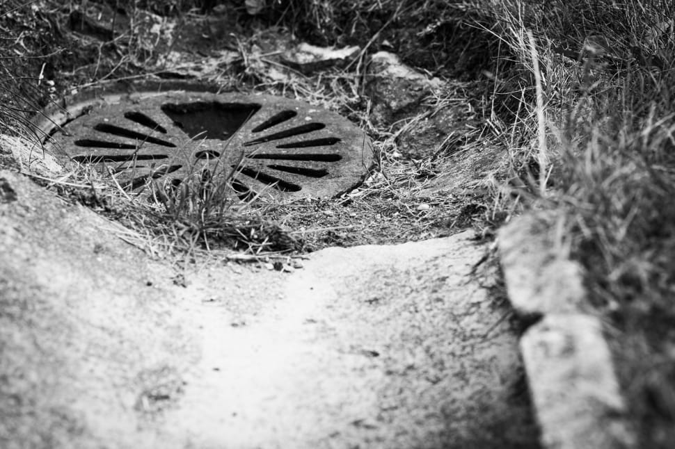 grayscale photo of man hole preview