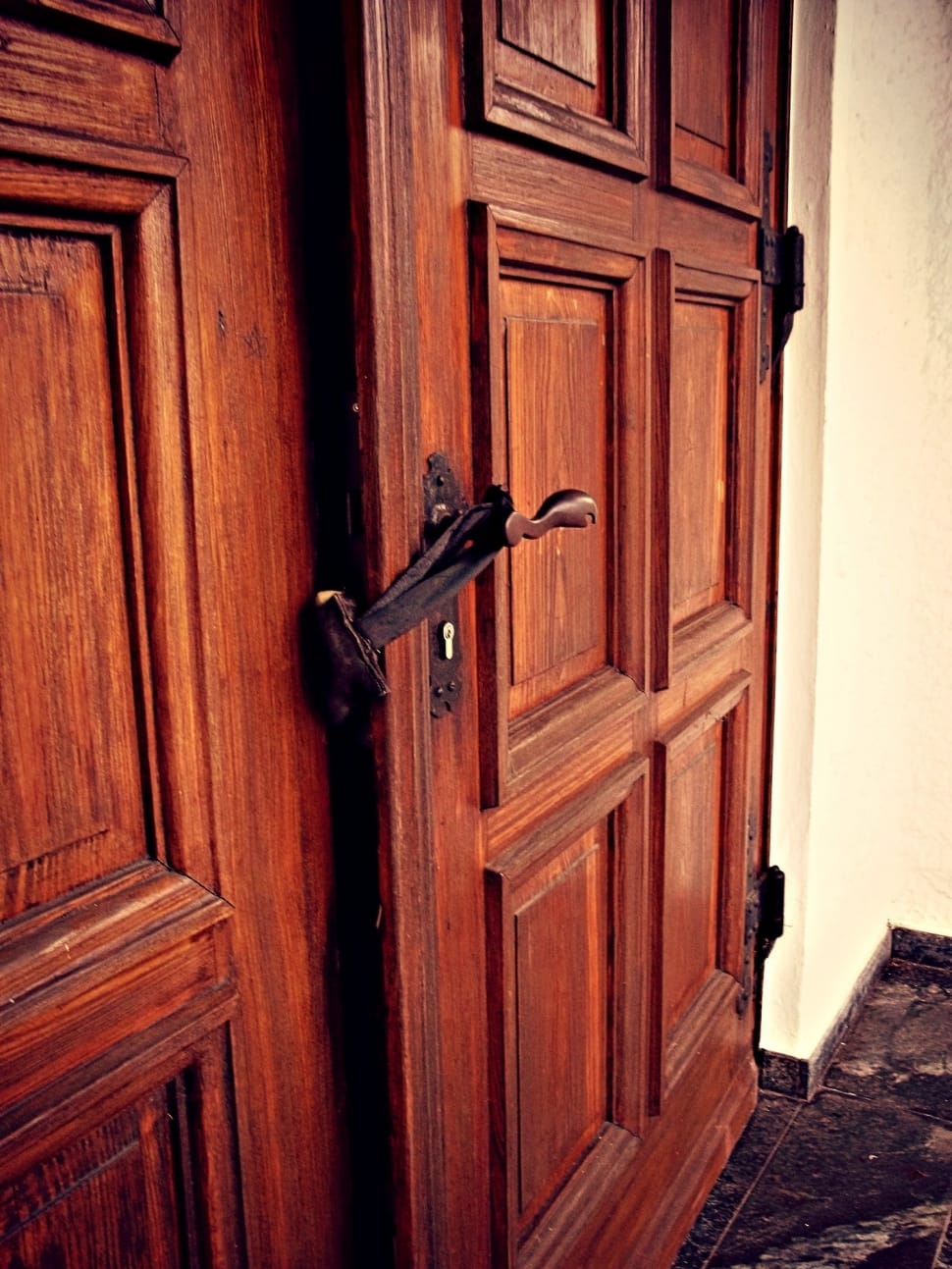 brown wooden door and gray steel lever preview
