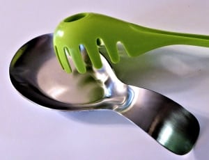 silver scoop and green plastic ladle thumbnail